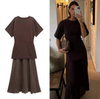 Dress with Pleated Skirt the style manager