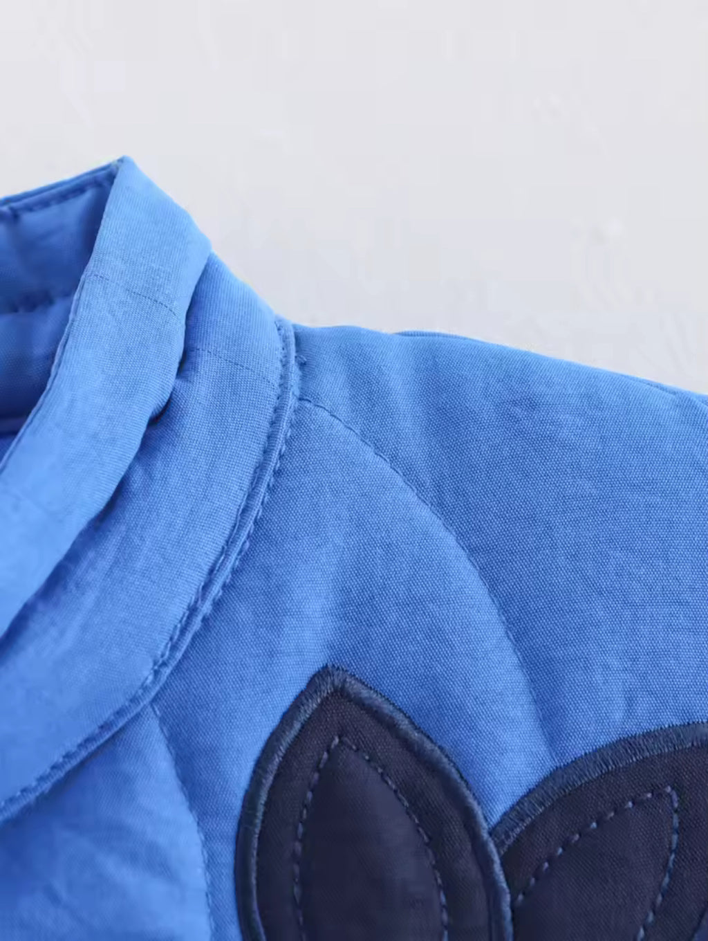 Quilted Jacket with Flower Patches